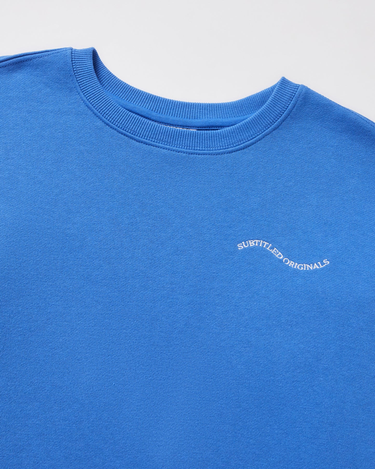 Teen Girls Oversized Wave Origin Fleece Crew Neck Jumper in Cobalt Blue