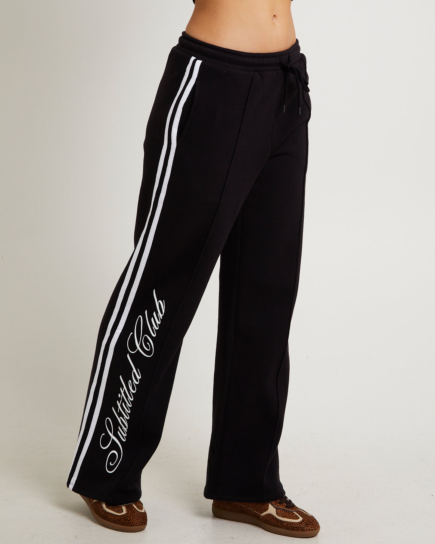 Subtitled Wellness Club Baggy Trackpants