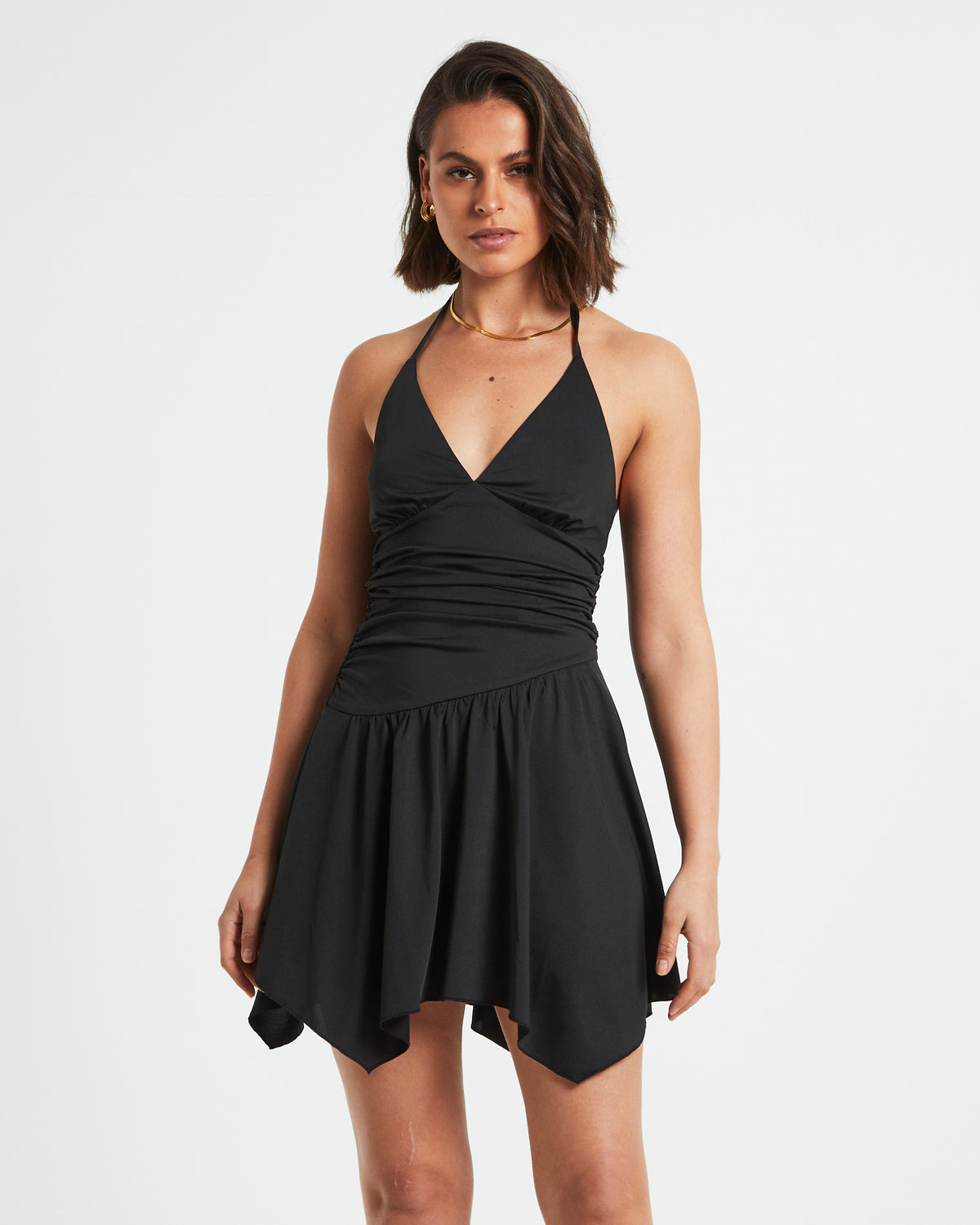 Sawyer Asymetric Hem Halter Mini Dress in Black BLACK