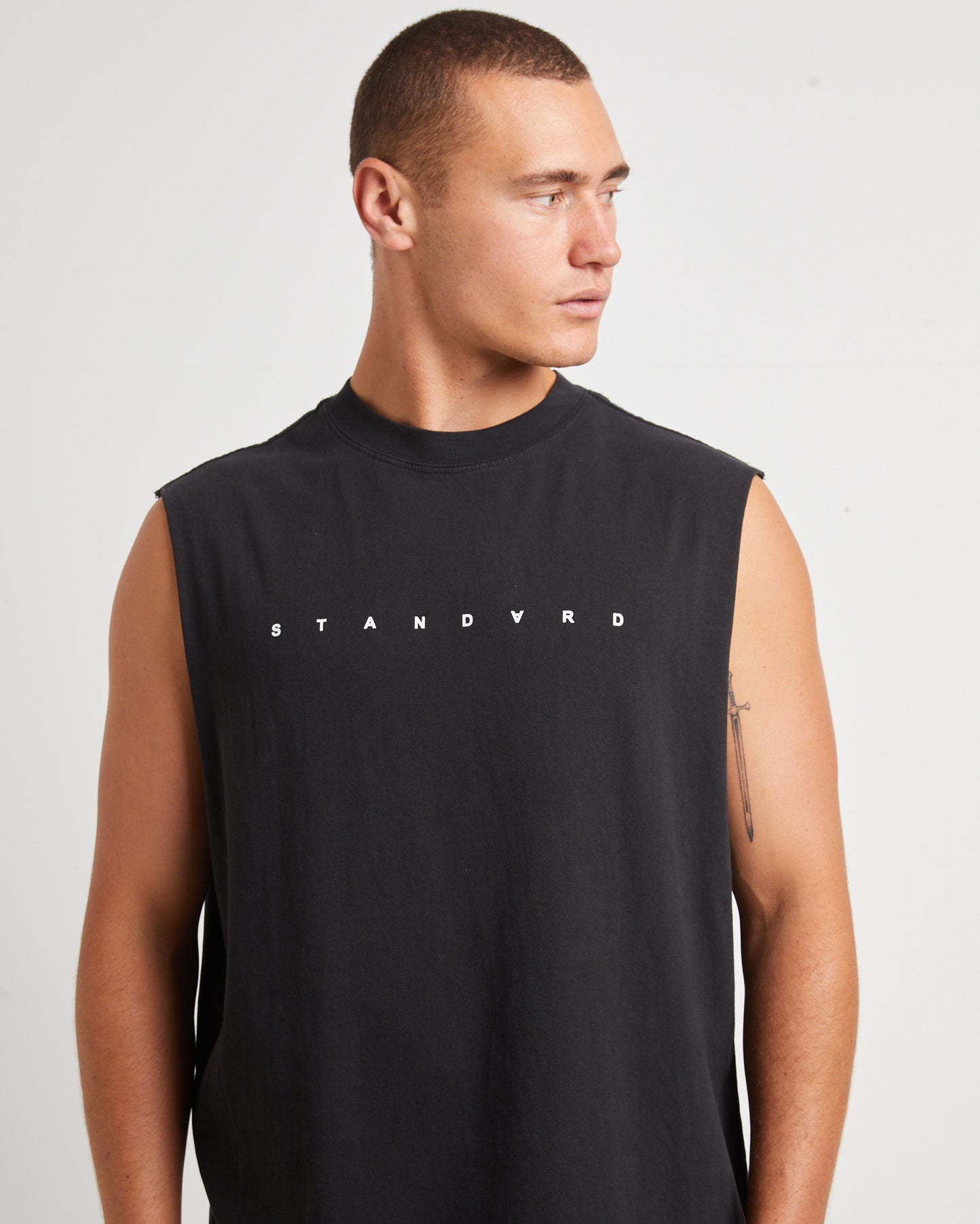 Kerning Muscle Tee in Black